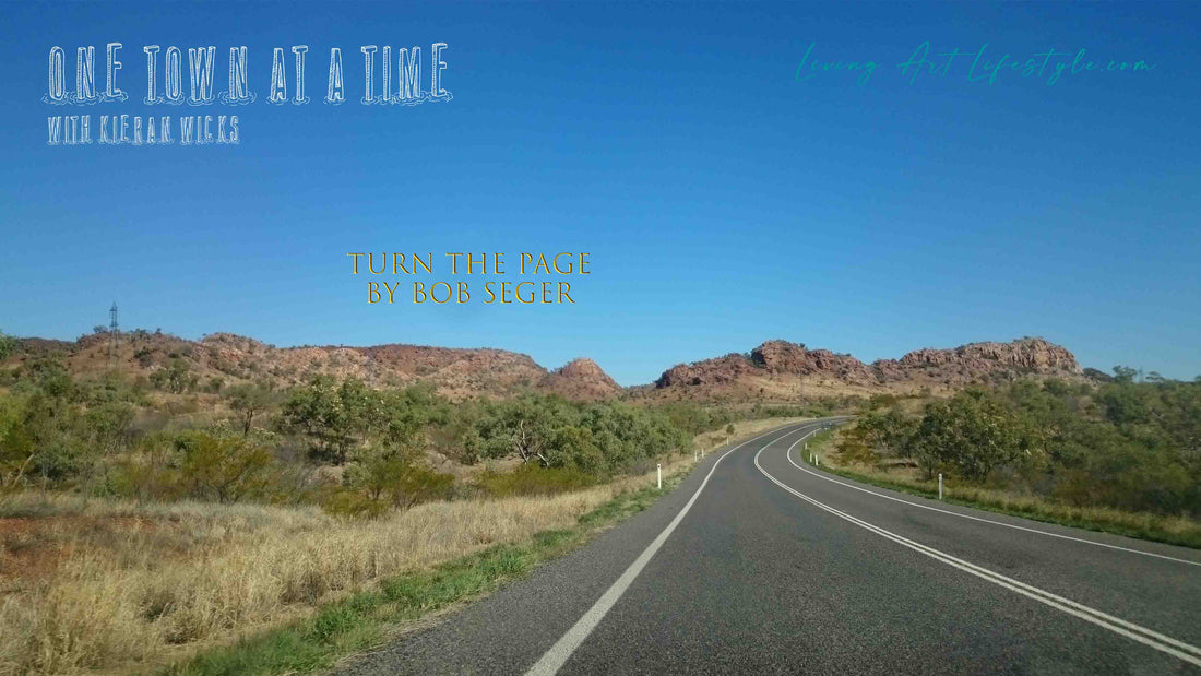 Turn the Page by Bob Seger - Acoustic Cover by Kieran Wicks - Highway road curving into the distant outback rocky mountain near Cloncurry NW QLD