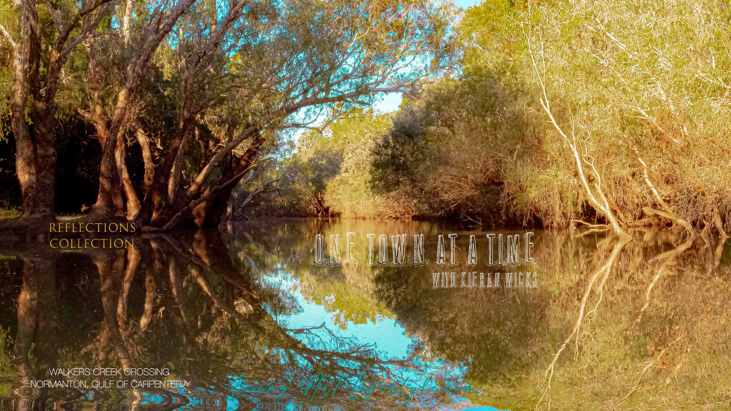 OUTBACK AUSTRALIA NEAR NORMANTON QLD Giant Tree and reflection in water gulf of Carpenteria